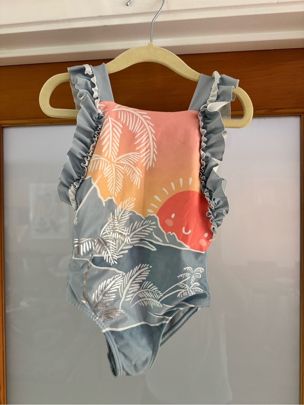 Girls' Ruffled One-Piece Swimsuit in Pink and Gray with Sunset Print